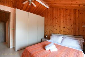 Postel nebo postele na pokoji v ubytování Moresco Apartment