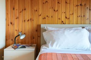 Postel nebo postele na pokoji v ubytování Moresco Apartment + 12 fotografií