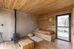 Katil atau katil-katil dalam bilik di La Calma Ecolodge 2