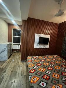 Postel nebo postele na pokoji v ubytování Hotel Lagoon Inn - Malviya Nagar