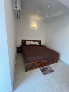 Postel nebo postele na pokoji v ubytování Hotel Lagoon Inn - Malviya Nagar
