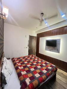 Postel nebo postele na pokoji v ubytování Hotel Lagoon Inn - Malviya Nagar