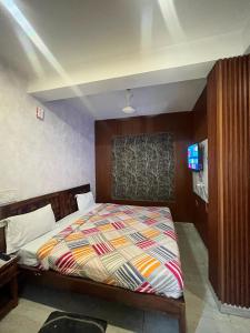 Postel nebo postele na pokoji v ubytování Hotel Lagoon Inn - Malviya Nagar