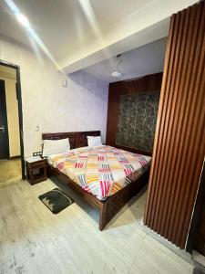 Postel nebo postele na pokoji v ubytování Hotel Lagoon Inn - Malviya Nagar