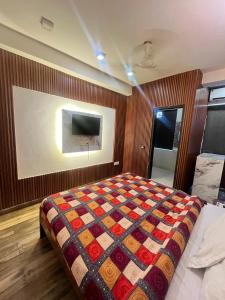 Postel nebo postele na pokoji v ubytování Hotel Lagoon Inn - Malviya Nagar
