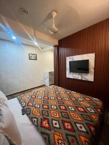 Postel nebo postele na pokoji v ubytování Hotel Lagoon Inn - Malviya Nagar
