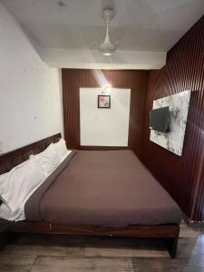 Postel nebo postele na pokoji v ubytování Hotel Lagoon Inn - Malviya Nagar