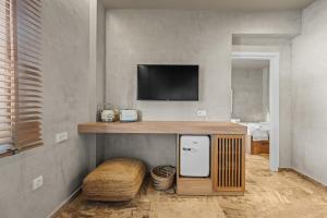 TV a/nebo společenská místnost v ubytování Nikos Apartments