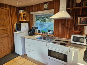 Una cocina o cocineta en Jagthytten 4 fotos más
