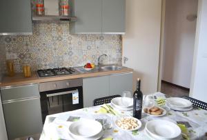 Köök või kööginurk majutusasutuses Pt62 Casa a T dell Orso x 6 ospiti +11 fotot