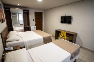 TV a/nebo společenská místnost v ubytování Bessa Beach Hotel