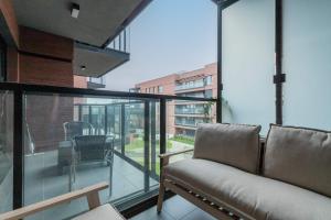 Zona de estar de Luxury Apartment at Sienna Grobla with Sauna Gym and Parking by Noclegi Renters