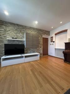 Et tv og/eller underholdning på Appartamento Alba