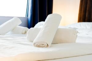 Posteľ alebo postele v izbe v ubytovaní StayWithUs , ground Floor