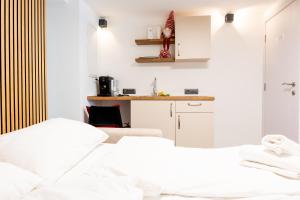 Posteľ alebo postele v izbe v ubytovaní StayWithUs , ground Floor