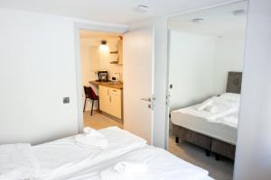 Posteľ alebo postele v izbe v ubytovaní StayWithUs , ground Floor + 17 fotografií