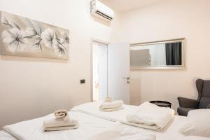 Posteľ alebo postele v izbe v ubytovaní StayWithUs , ground Floor