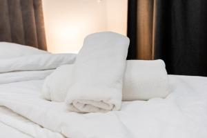Posteľ alebo postele v izbe v ubytovaní StayWithUs , ground Floor