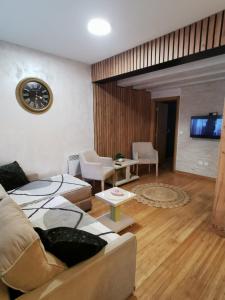 TV a/nebo společenská místnost v ubytování Apartman Adrijan