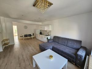 Et opholdsområde på Apartament Daisy