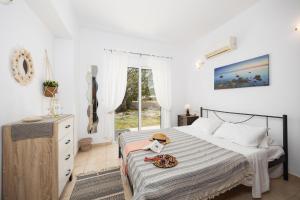 Ένα ή περισσότερα κρεβάτια σε δωμάτιο στο Villa Maia +21 φωτογραφίες