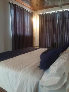 Letto o letti in una camera di Welcome Homestay