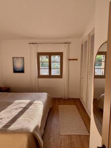 Кровать или кровати в номере Villa Amadea