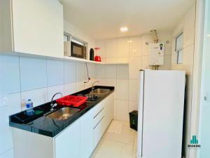 Fortaleza Sul Flats Service的厨房或小厨房