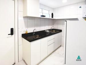 Fortaleza Sul Flats Service的厨房或小厨房