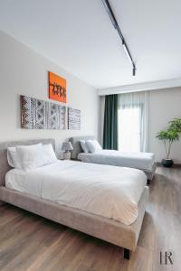 Katil atau katil-katil dalam bilik di Easy Rental Serviced Apartment in Zed El Sheikh Zayed