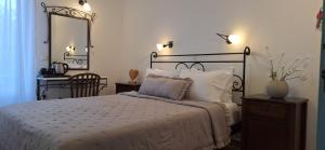Voodi või voodid majutusasutuse Brazzera Hotel toas