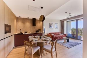 Kuchyň nebo kuchyňský kout v ubytování Apartamenty Świnoujście - Baltic Loft