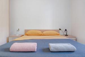 Postel nebo postele na pokoji v ubytování Casa Lierna