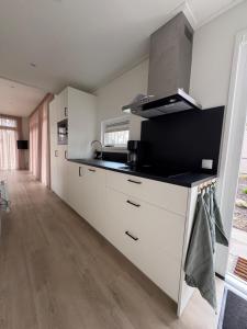 Kuchyň nebo kuchyňský kout v ubytování Chalet Vleugelvlucht