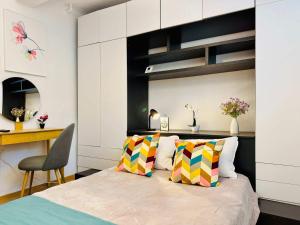 En eller flere senge i et værelse på Joy City Stay Nemoianu 8D