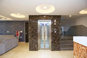 Fotografie z fotogalerie ubytování Hotel O M SUITES v Novém Dillí