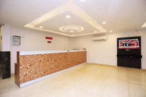TV a/nebo společenská místnost v ubytování Hotel O M SUITES