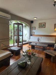 a living room with a couch and a table at Posada de San Isidro in San Isidro +52 photos