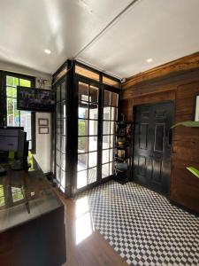 a room with a door and a room with a floor at Tremo Bustamante in Santiago