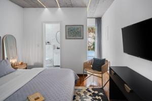 Postel nebo postele na pokoji v ubytování Villa Island Pearl A Stunning Oasis of Luxury and Serenity on Brač Island + 35 fotografií