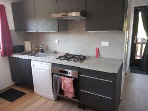 Kuchyň nebo kuchyňský kout v ubytování Chez Isabelle + 13 fotografií