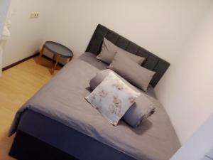 Postel nebo postele na pokoji v ubytování Apartment Metzingen City