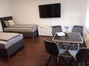 Postel nebo postele na pokoji v ubytování Apartment Metzingen City