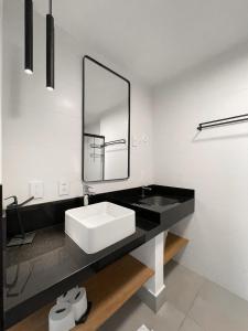 Et badeværelse på Flat Elegante com Muito Estilo no Edificio Vertigo