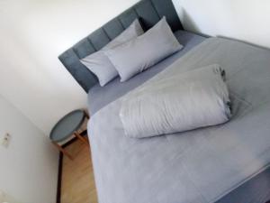 Postel nebo postele na pokoji v ubytování Apartment Metzingen City