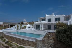 Fotografie z fotogalerie ubytování Super Luxury Mykonos Villa Villa Saorsa 5 Bedroom Infinity Pool Panoramic Sea And Sunset Views Euaggelistraki v destinaci Dexamenes