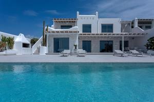 Fotografie z fotogalerie ubytování Super Luxury Mykonos Villa Villa Saorsa 5 Bedroom Infinity Pool Panoramic Sea And Sunset Views Euaggelistraki v destinaci Dexamenes