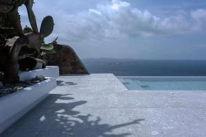 Fotografie z fotogalerie ubytování Super Luxury Mykonos Villa Villa Saorsa 5 Bedroom Infinity Pool Panoramic Sea And Sunset Views Euaggelistraki v destinaci Dexamenes