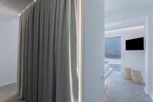 Fotografie z fotogalerie ubytování Super Luxury Mykonos Villa Villa Saorsa 5 Bedroom Infinity Pool Panoramic Sea And Sunset Views Euaggelistraki v destinaci Dexamenes