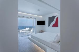 Fotografie z fotogalerie ubytování Super Luxury Mykonos Villa Villa Saorsa 5 Bedroom Infinity Pool Panoramic Sea And Sunset Views Euaggelistraki v destinaci Dexamenes